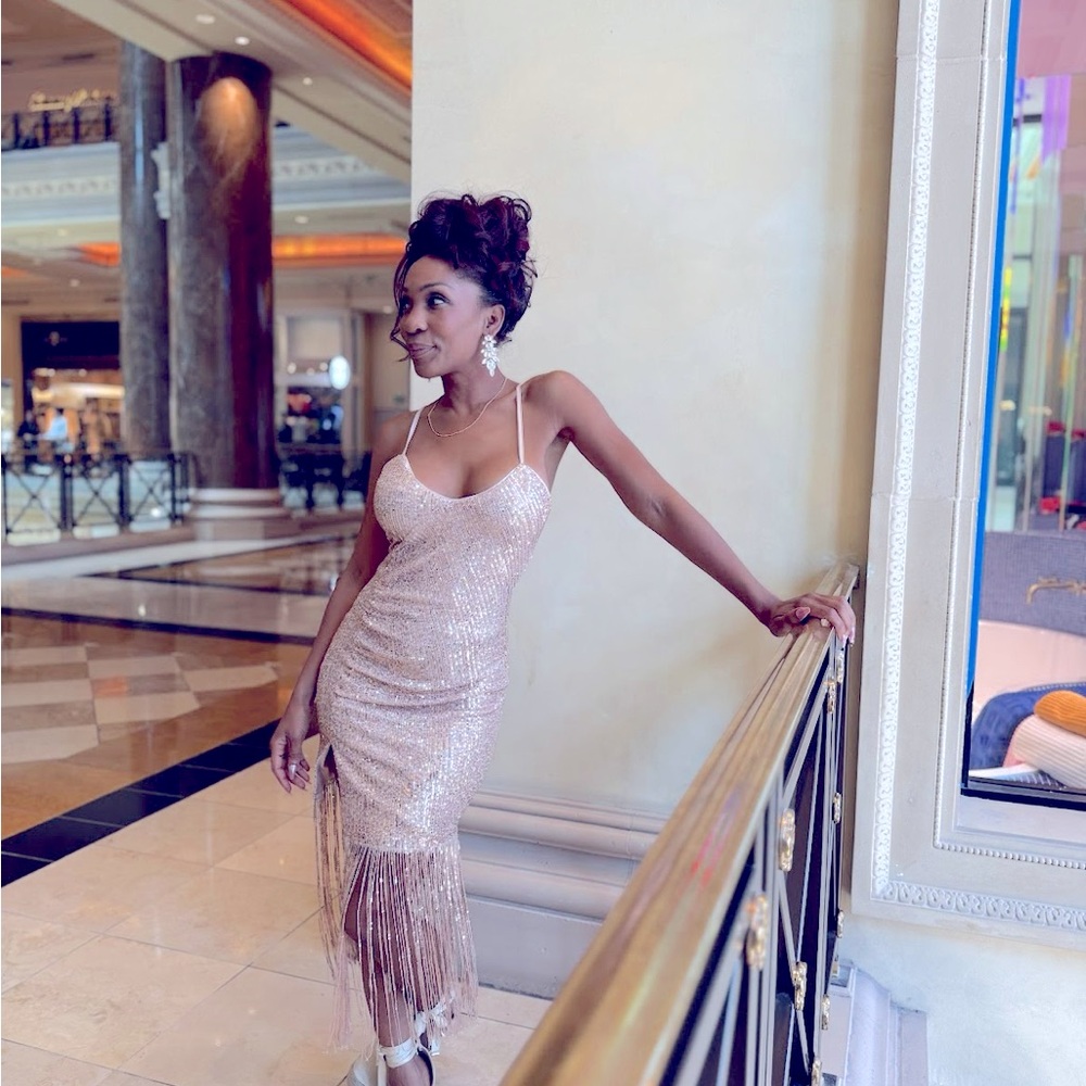 Gold glitter dress with shimmery fringe